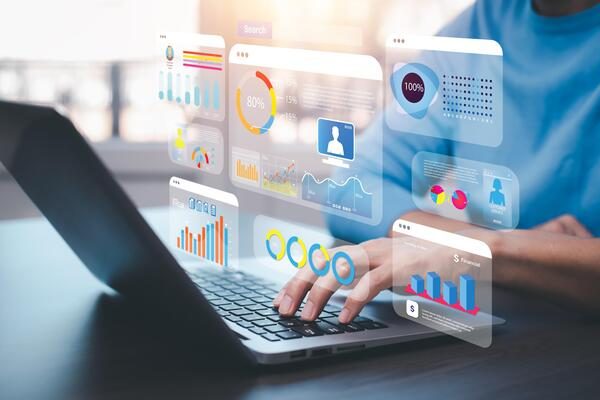 businessman-using-a-laptop-with-analytics-and-data-management-systems-analyst-working-in-business-analytics-and-data-management-systems-to-make-reports-and-corporate-strategy-for-finance-operations-photo